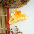 Vibrant Floral Hair Claws – Add a Pop of Color to Your Style!