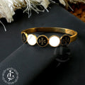 Elegant Cross Emblem Gold Bangle