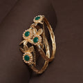 Elegant Emerald-Studded Gold Bangles with Pearl Accents